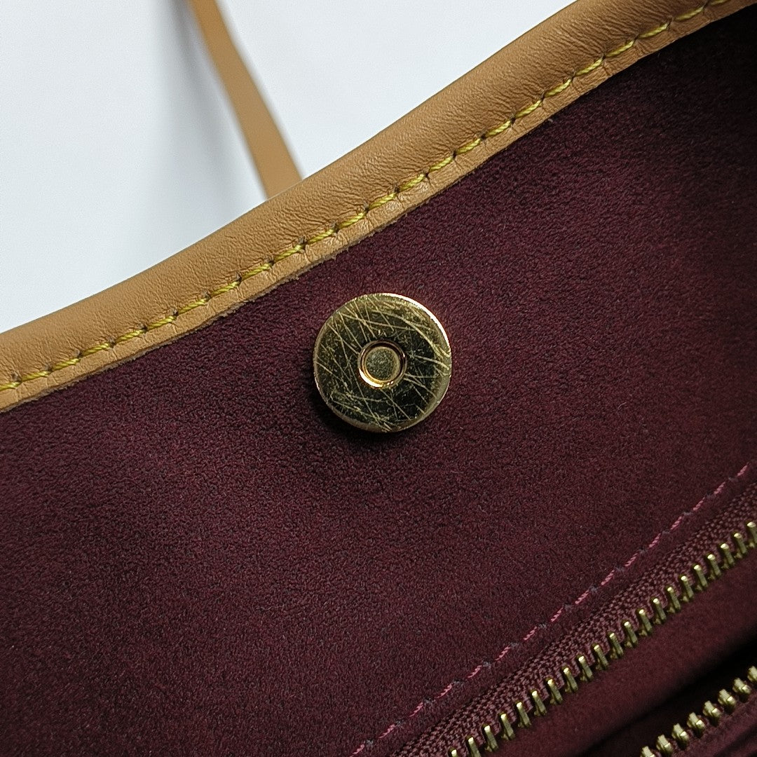 CARRYALL PM Monogram Coated Canvas Brown