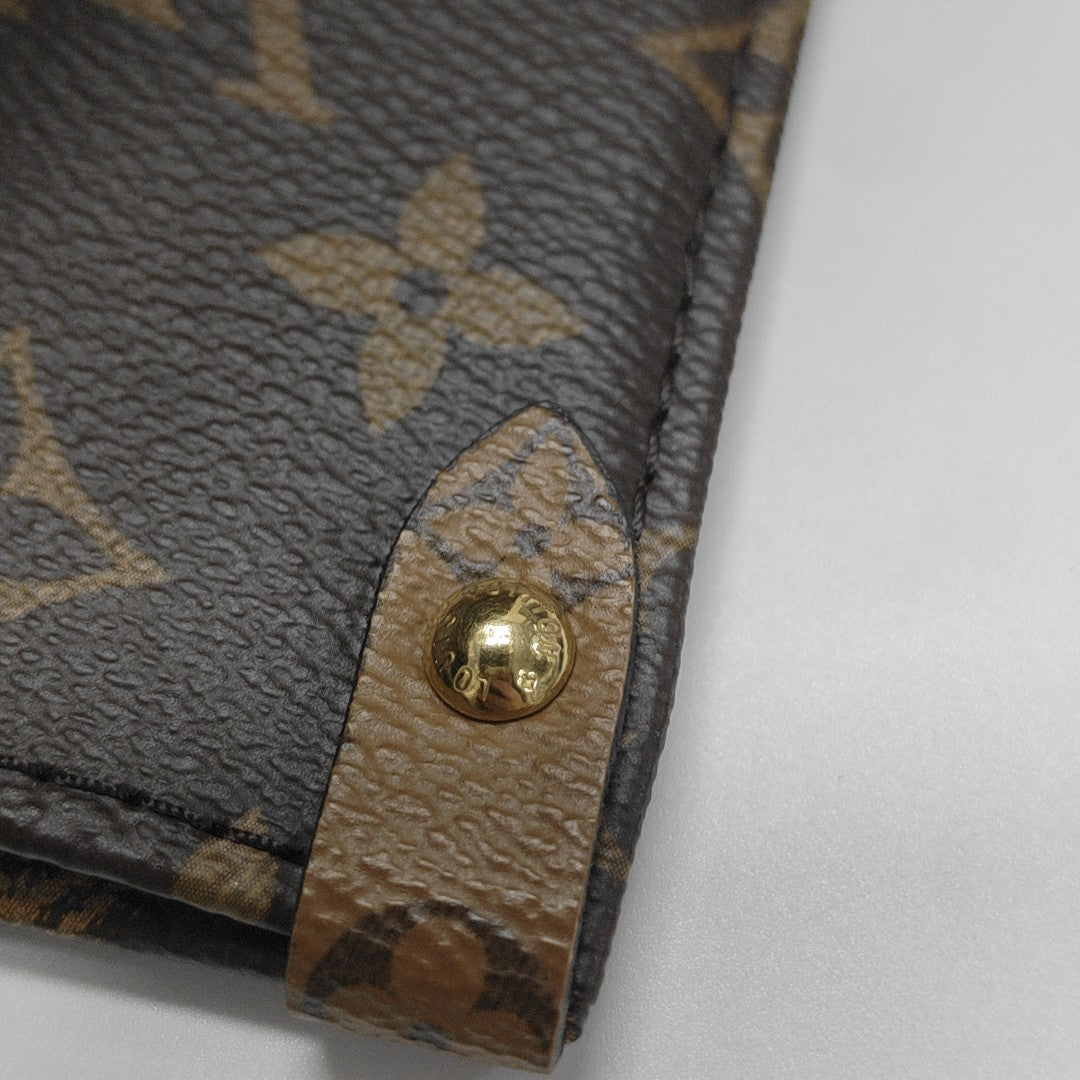 ONTHEGO MM Monogram Coated Canvas Brown