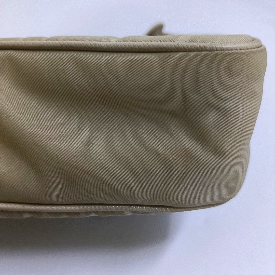 Authenticated pre-owned  Re-Edition2005 Nylon Beige - Crossbody Bag at Looply