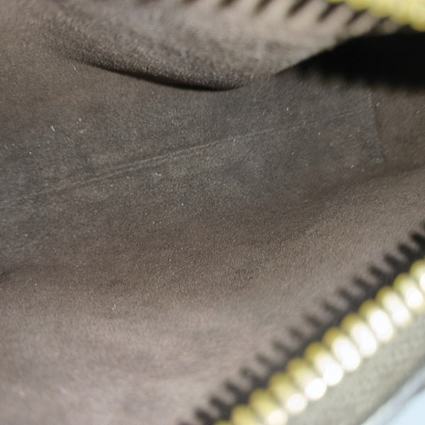 SIDE TRUNK PM Monogram Coated Canvas Brown