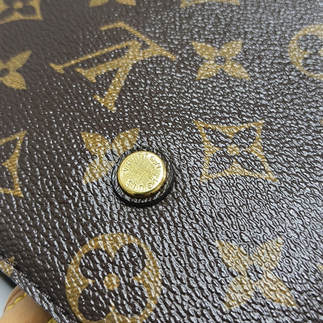 MONTAIGNE GM Monogram Coated Canvas Brown