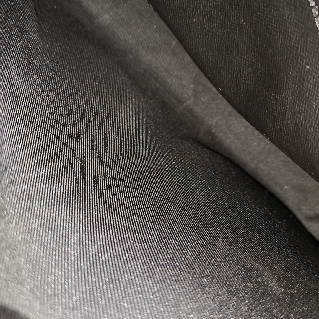 Pochette Voyag MM Monogram Coated Canvas Gray