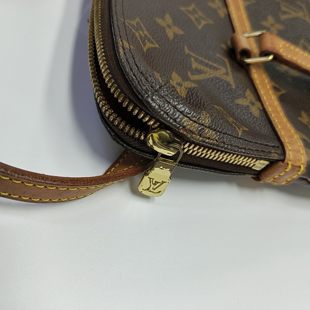 COUSSIN GM Monogram Coated Canvas Brown