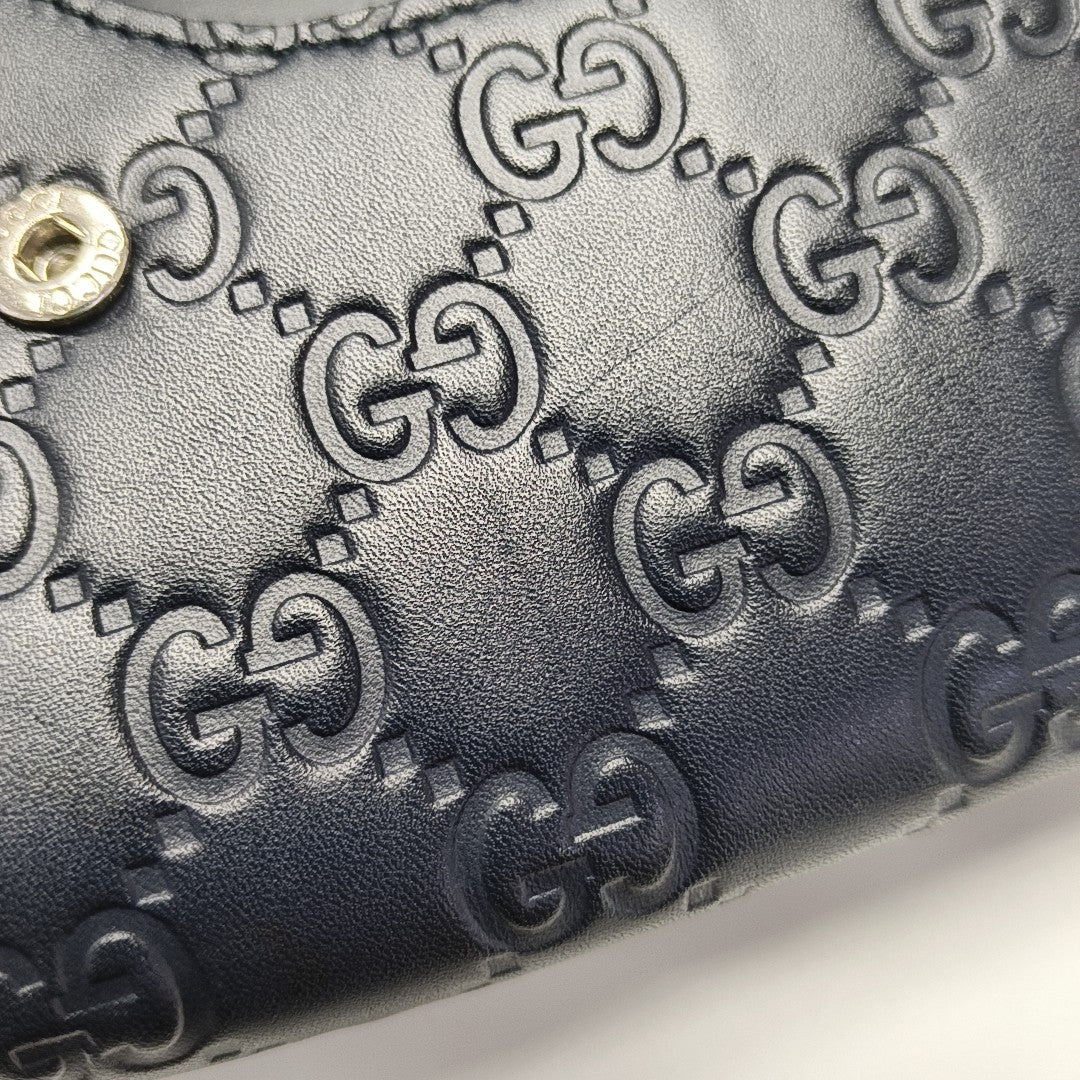 Monogram Calfskin Clutch Blue