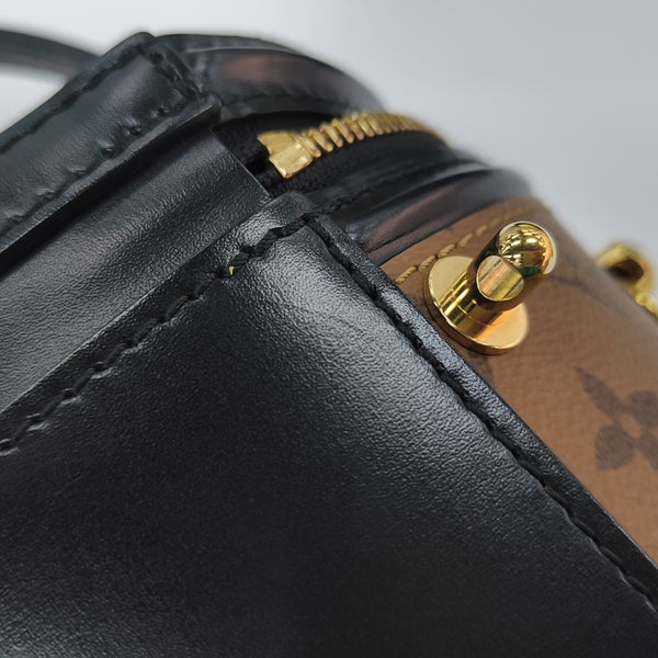 CANNES PM Monogram Coated Canvas Brown