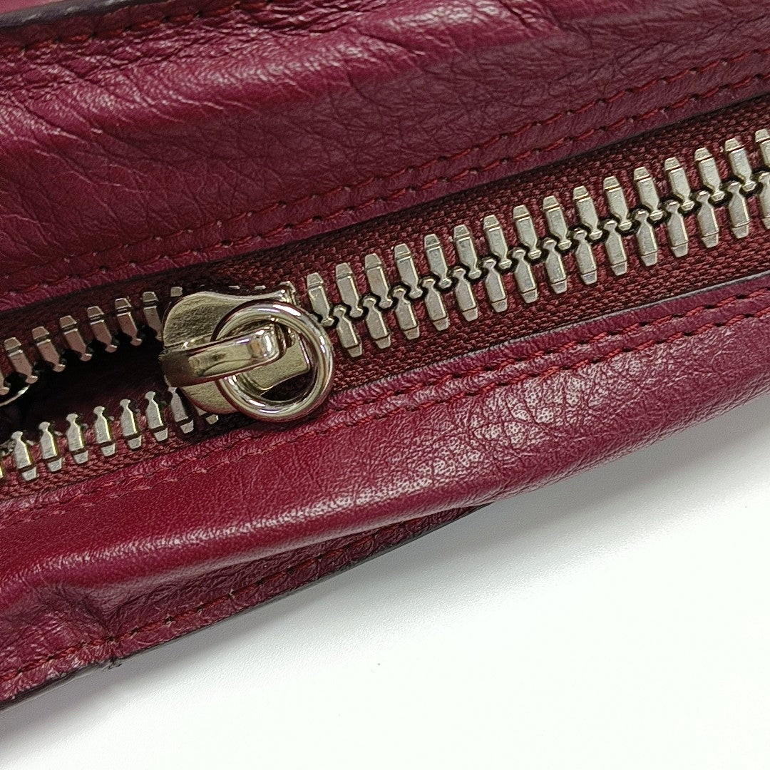 Authenticated pre-owned  Papier Calfskin Burgundy - Clutch at Looply