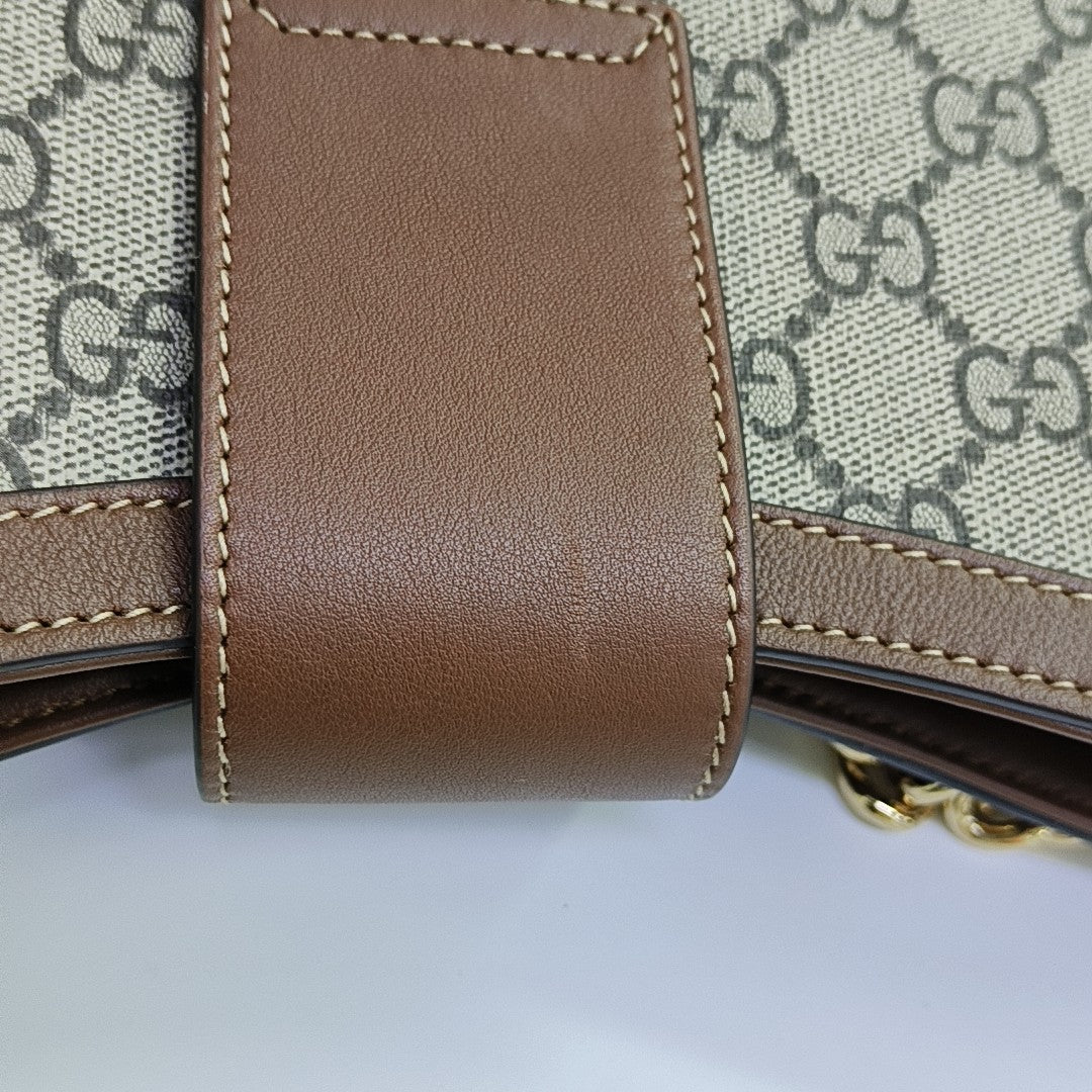 Padlock Medium Monogram Coated Canvas Brown