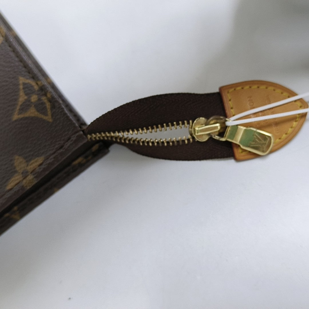 TOILET POCKET 26 Monogram Coated Canvas Brown