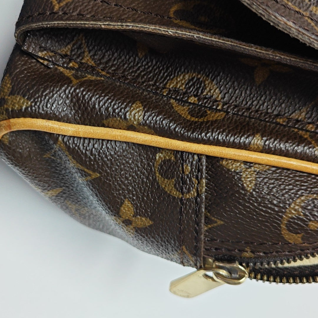 MANHATTAN PM Monogram Coated Canvas Brown
