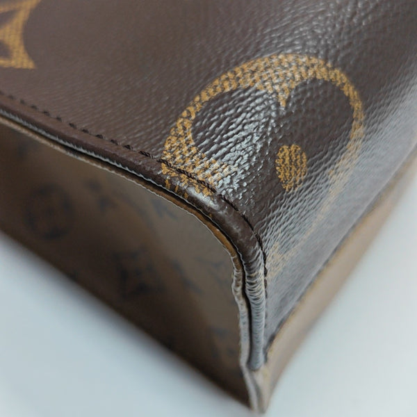 ONTHEGO PM Monogram Coated Canvas Brown