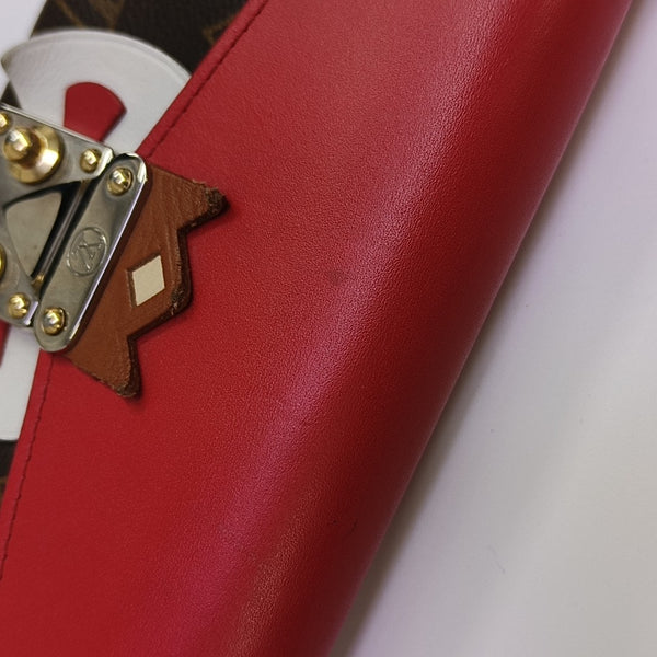 SARAH Monogram Coated Canvas Brown Wallet
