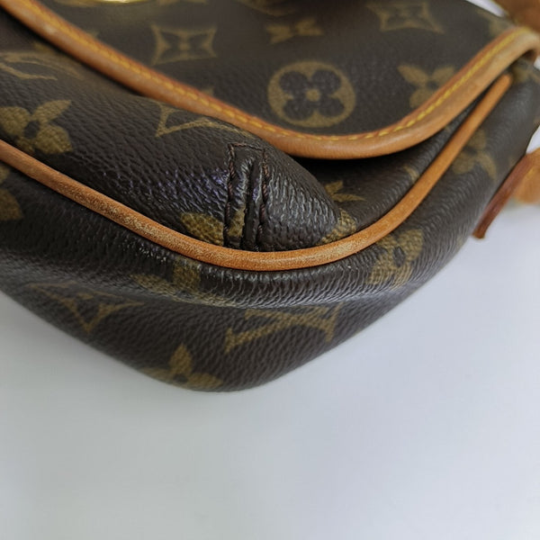 TIKAL Monogram Coated Canvas Brown