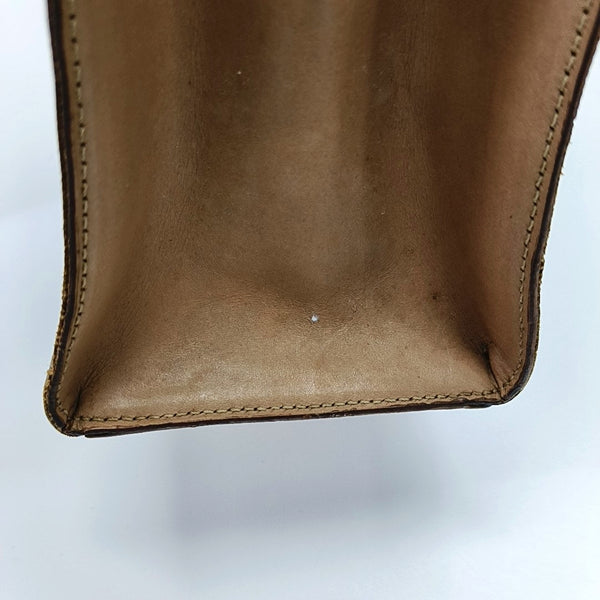 Authenticated pre-owned  MACADAM BLASON TRIOMPHE Coated Canvas Brown - Top Handle Bag at Looply
