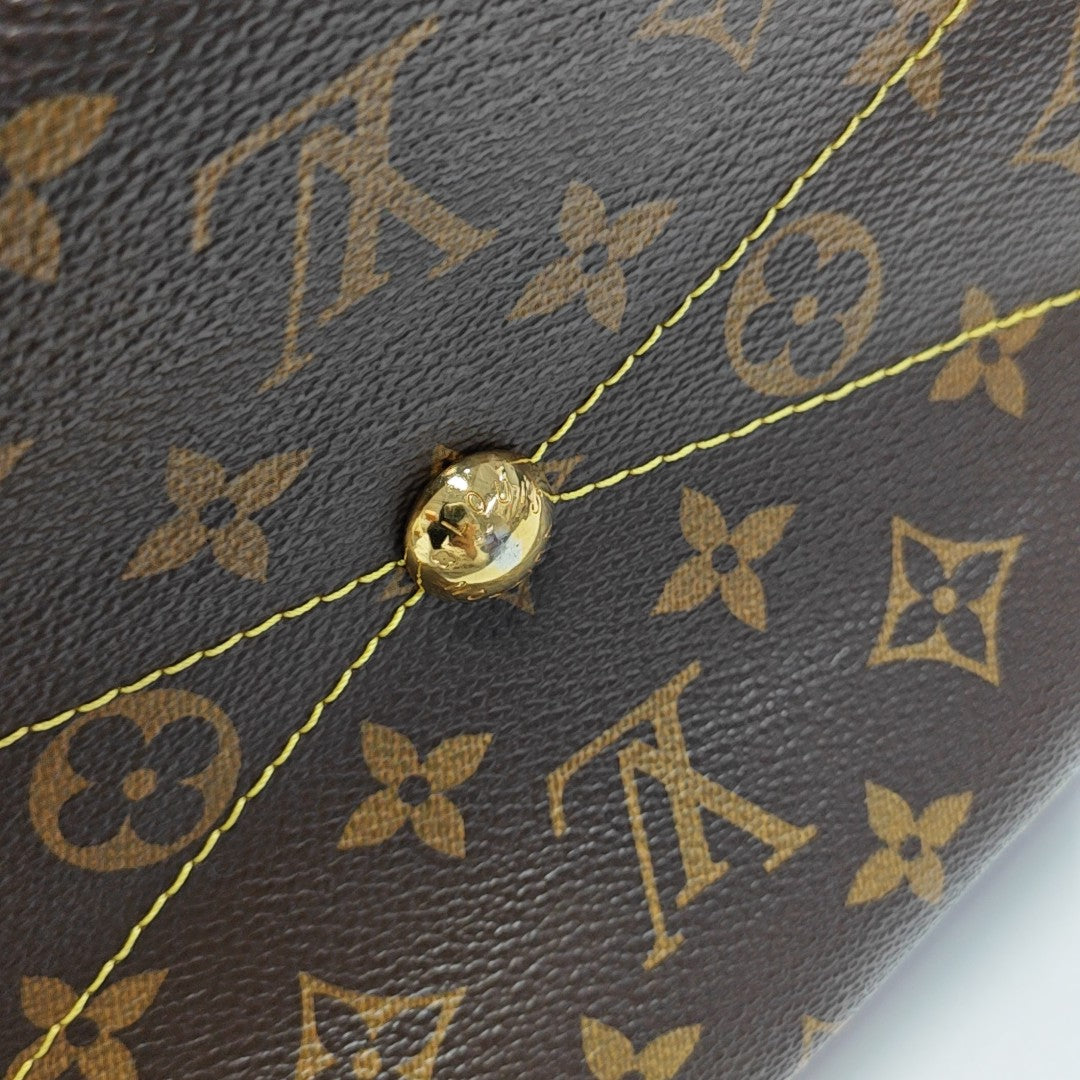 TIVOLI PM Monogram Coated Canvas Brown