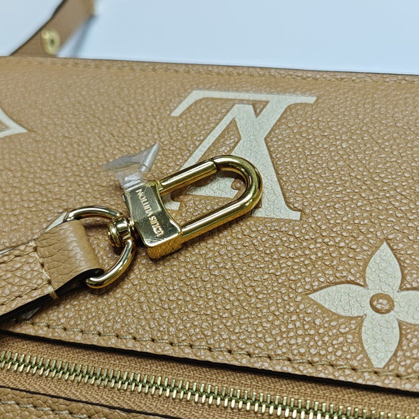 MÉTIS EAST WEST Monogram Calfskin Brown