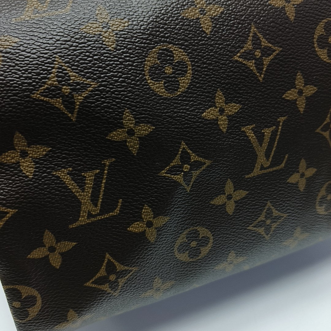 SPEEDY 25 Monogram Coated Canvas Brown