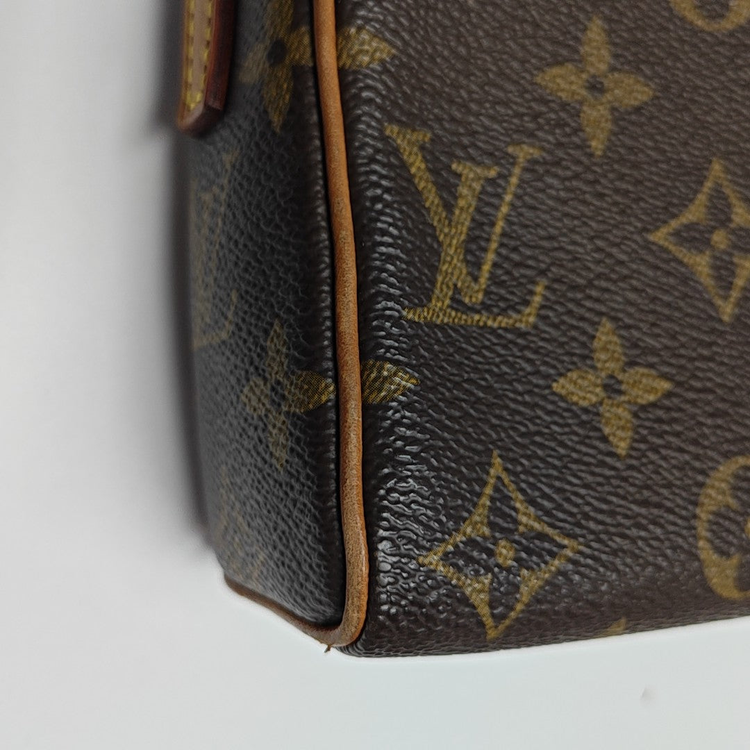 RECITAL Monogram Coated Canvas Brown