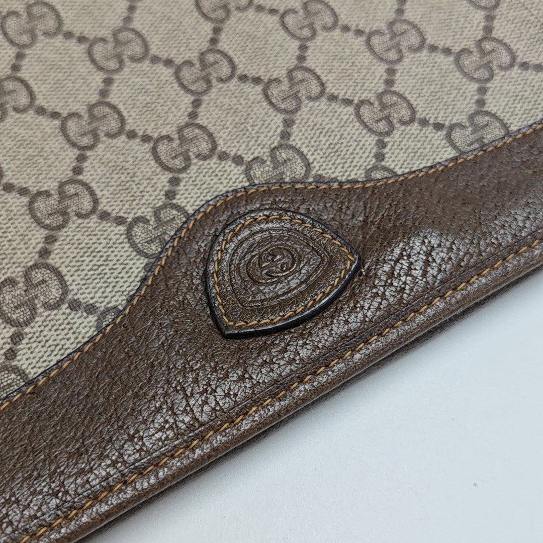 Monogram Coated Canvas Clutch Beige