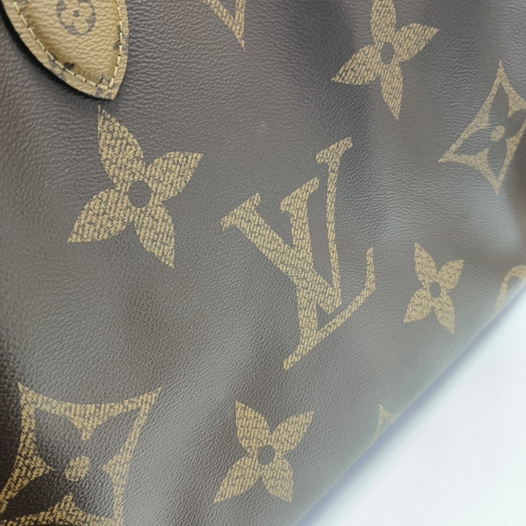 ONTHEGO GM Monogram Coated Canvas Brown
