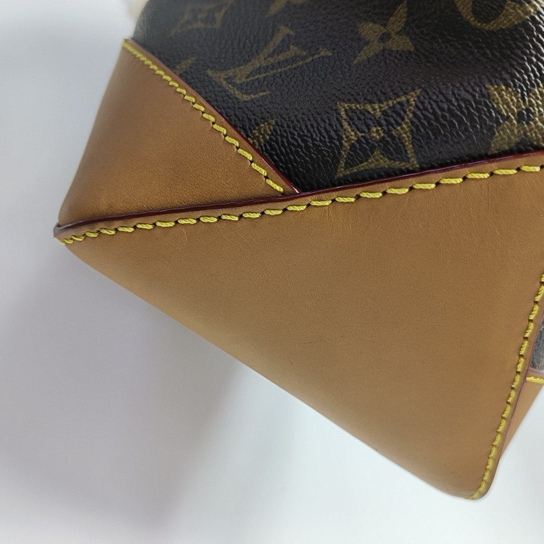 CABAS VOYAGE PM Monogram Coated Canvas Brown