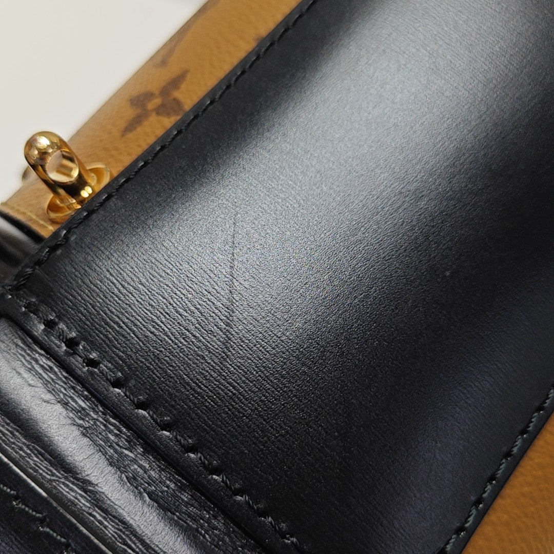 CANNES PM Monogram Coated Canvas Brown