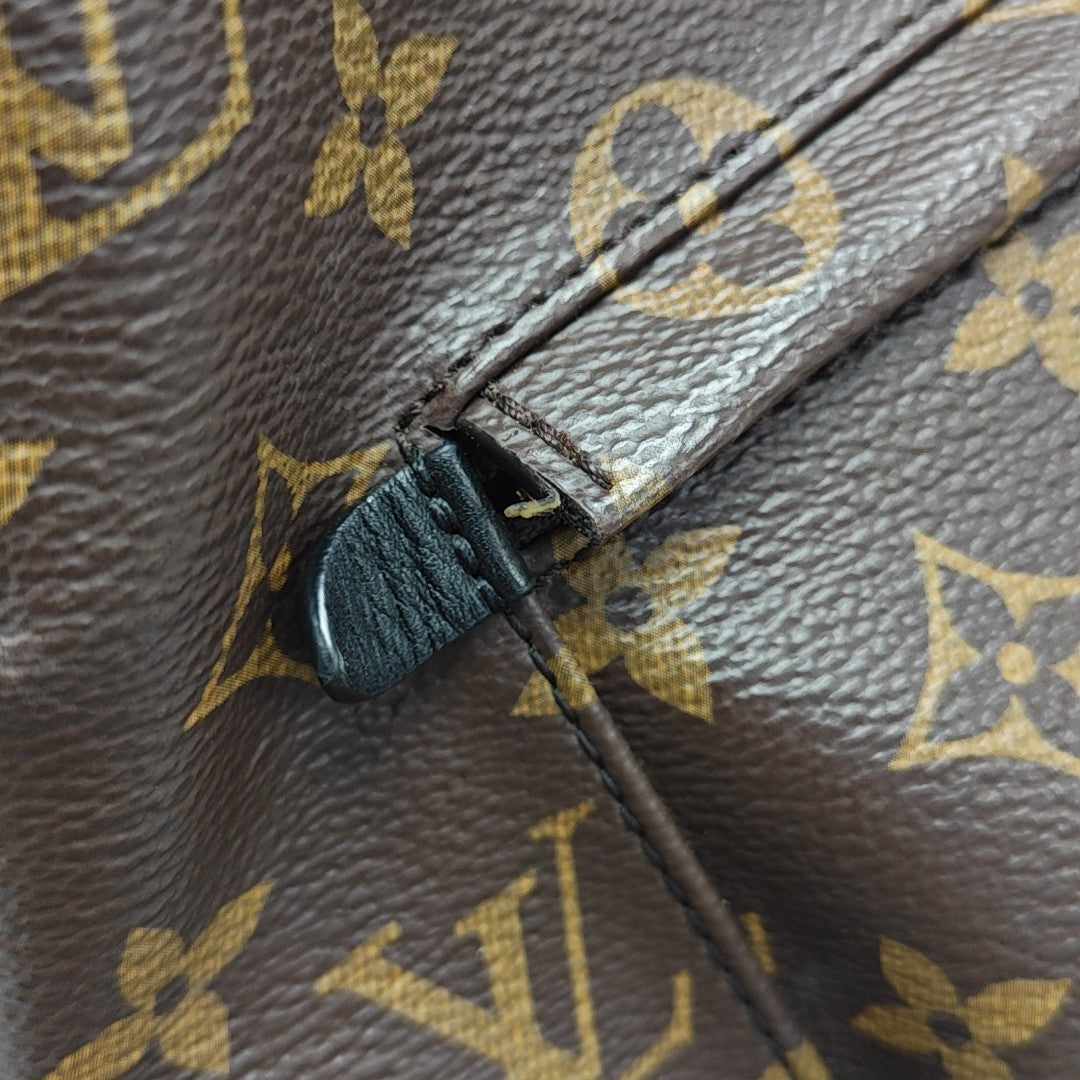 Monogram Coated Canvas Backpack Brown