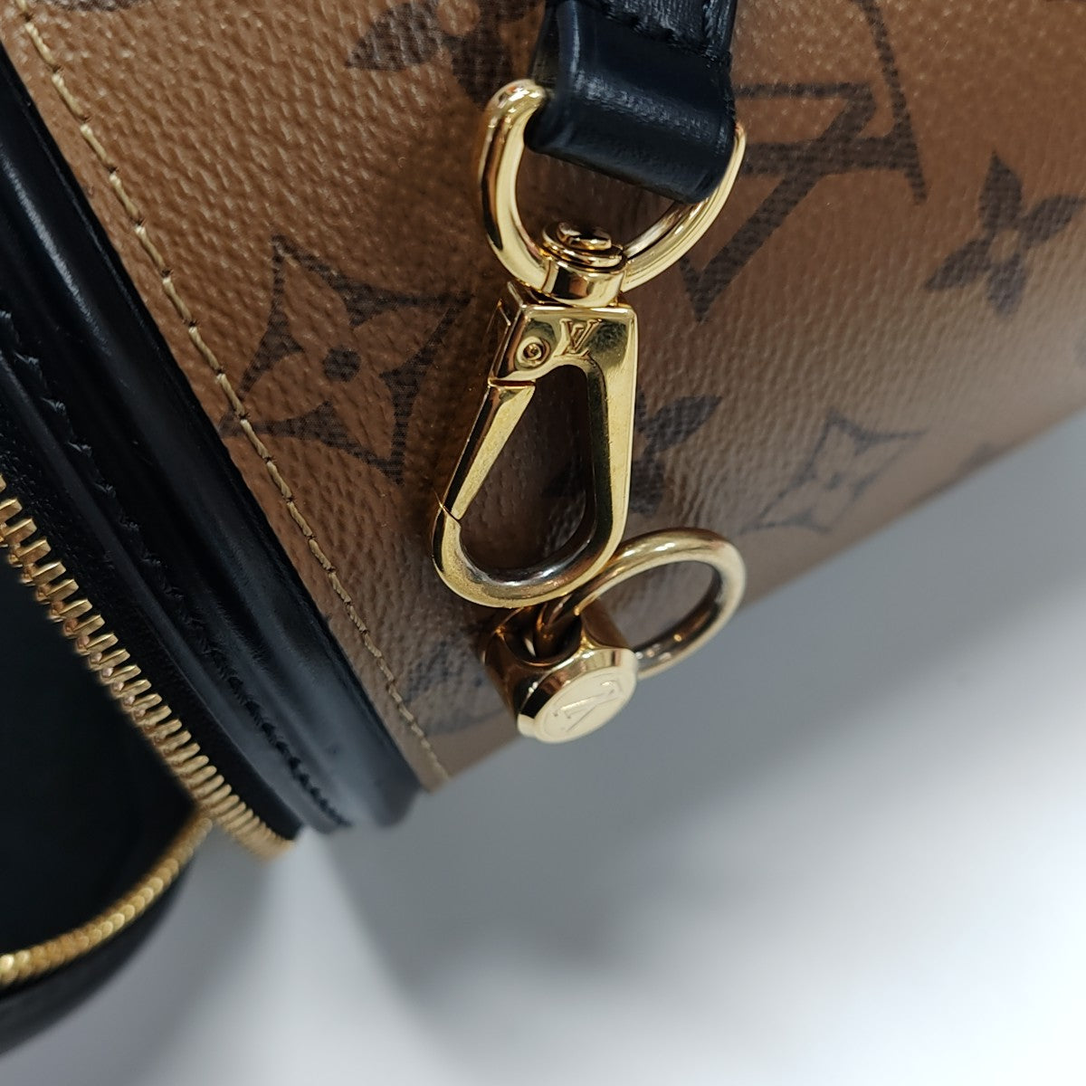 CANNES PM Monogram Coated Canvas Brown