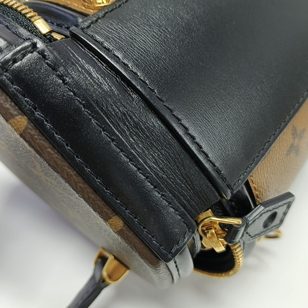 CANNES PM Monogram Coated Canvas Brown