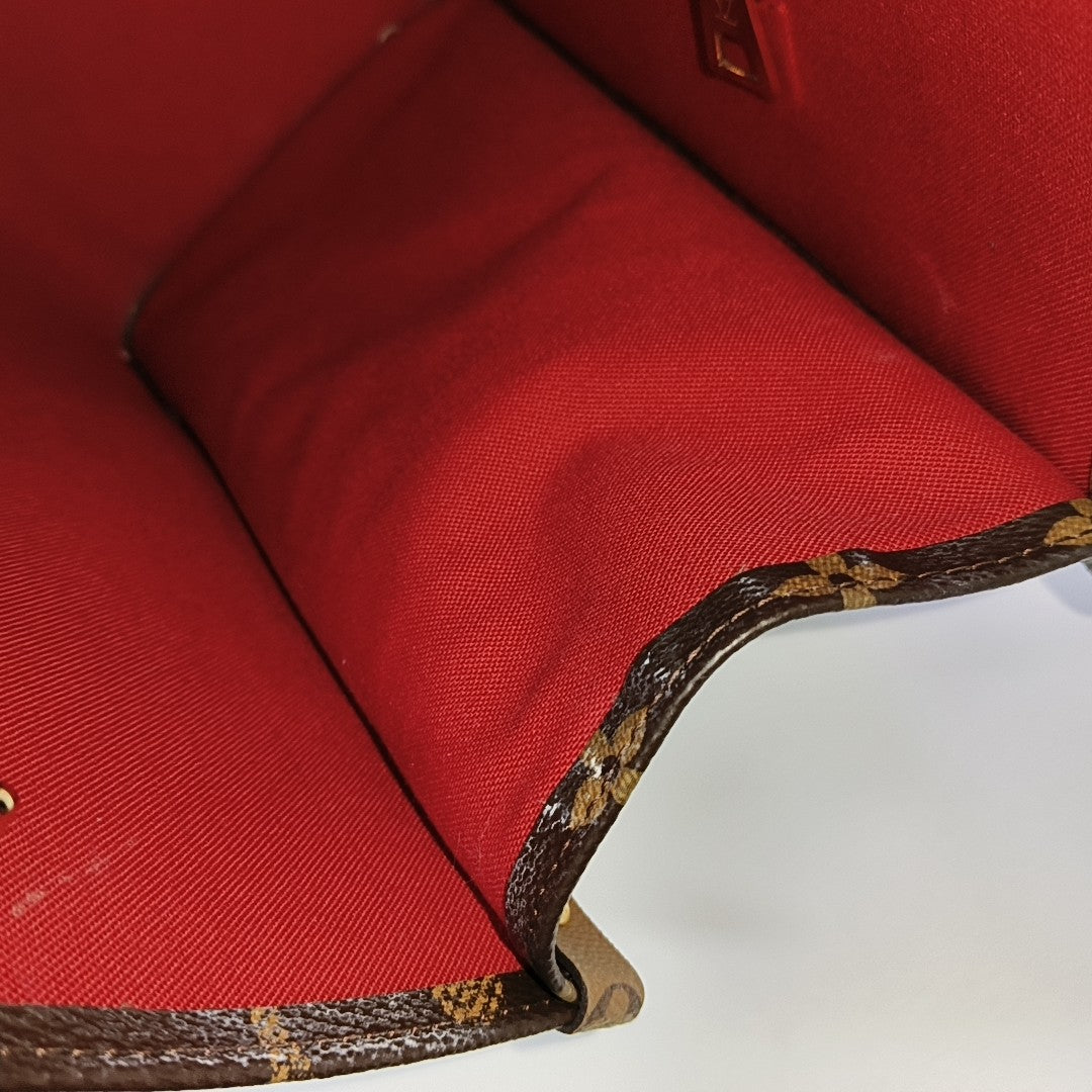 ONTHEGO MM Monogram Coated Canvas Brown