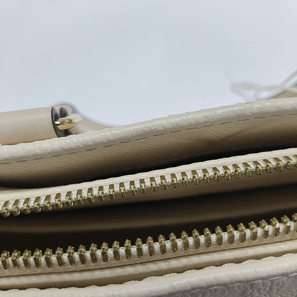 ONTHEGO EAST WEST PM Monogram Calfskin White