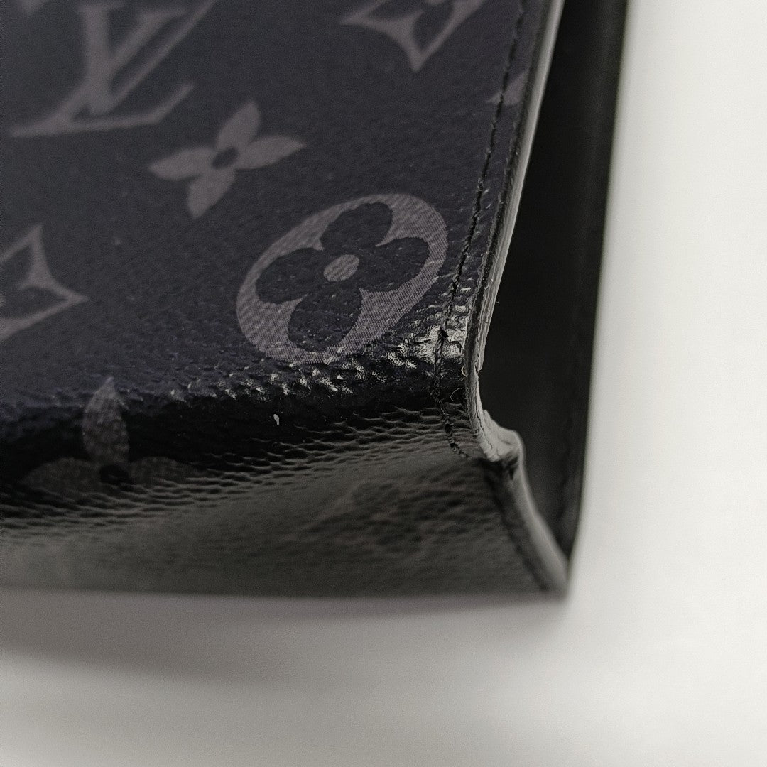 Pochette Voyag MM Monogram Coated Canvas Black