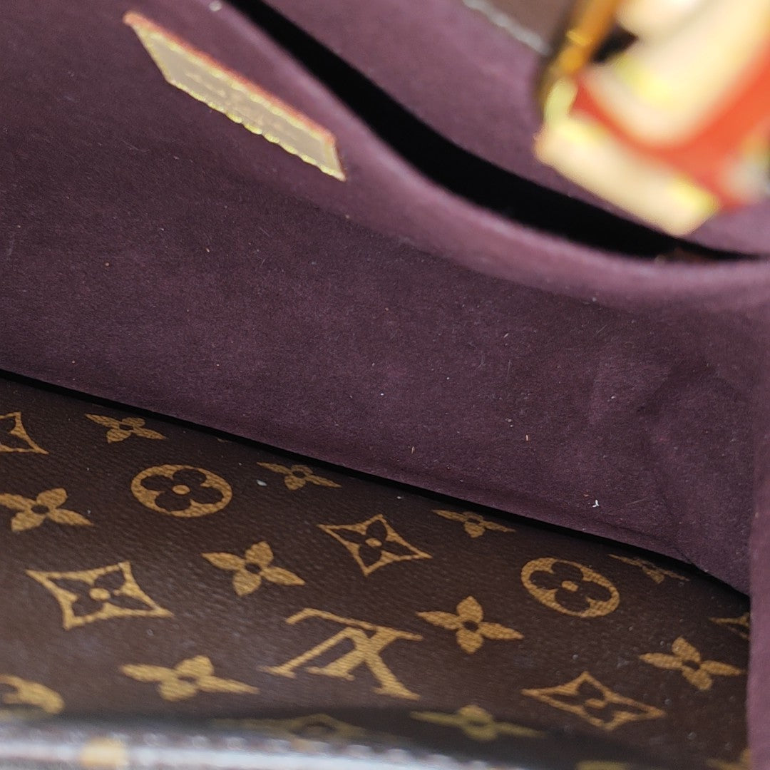 MONTAIGNE BB Monogram Coated Canvas Brown