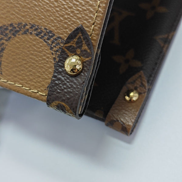 ONTHEGO MM Monogram Coated Canvas Brown
