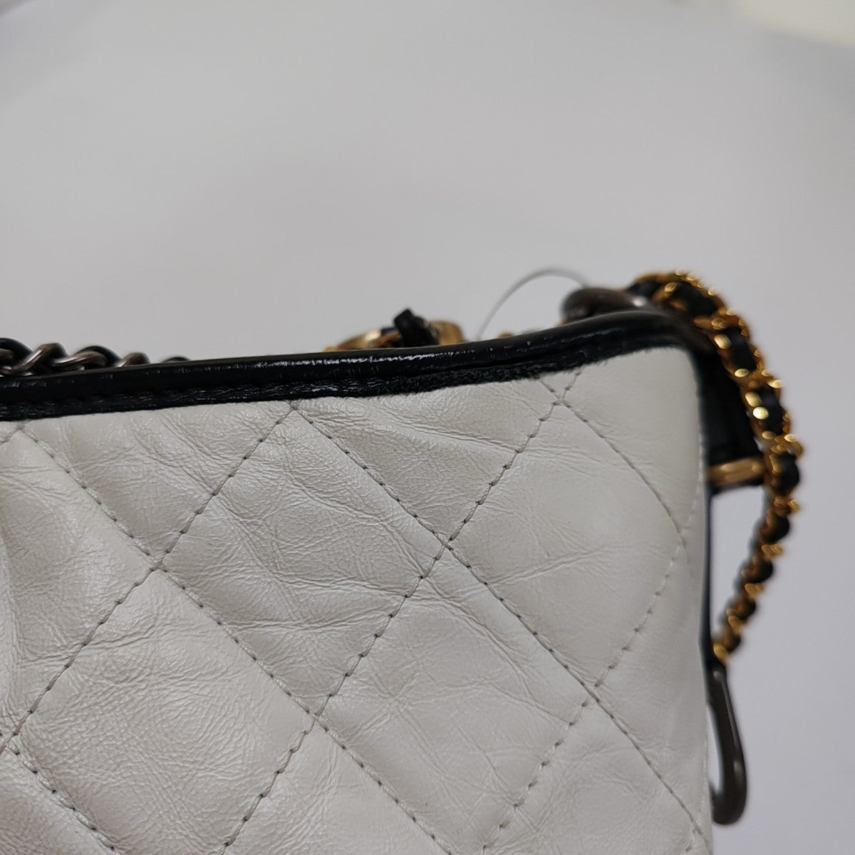 Authenticated pre-owned  GABRIELLE Medium Quilted Calfskin White - Crossbody Bag at Looply