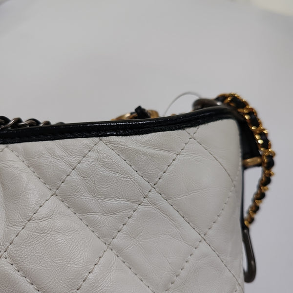 Authenticated pre-owned  GABRIELLE Medium Quilted Calfskin White - Crossbody Bag at Looply