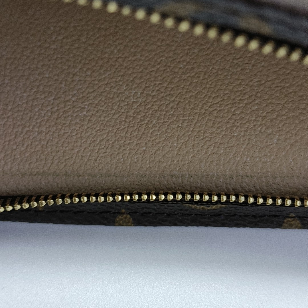 TOILET POCKET 26 Monogram Coated Canvas Brown