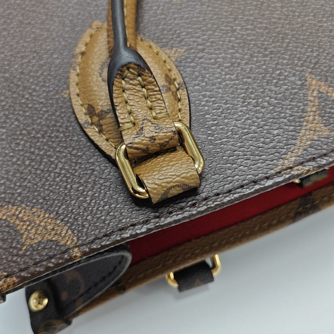 ONTHEGO PM Monogram Coated Canvas Brown
