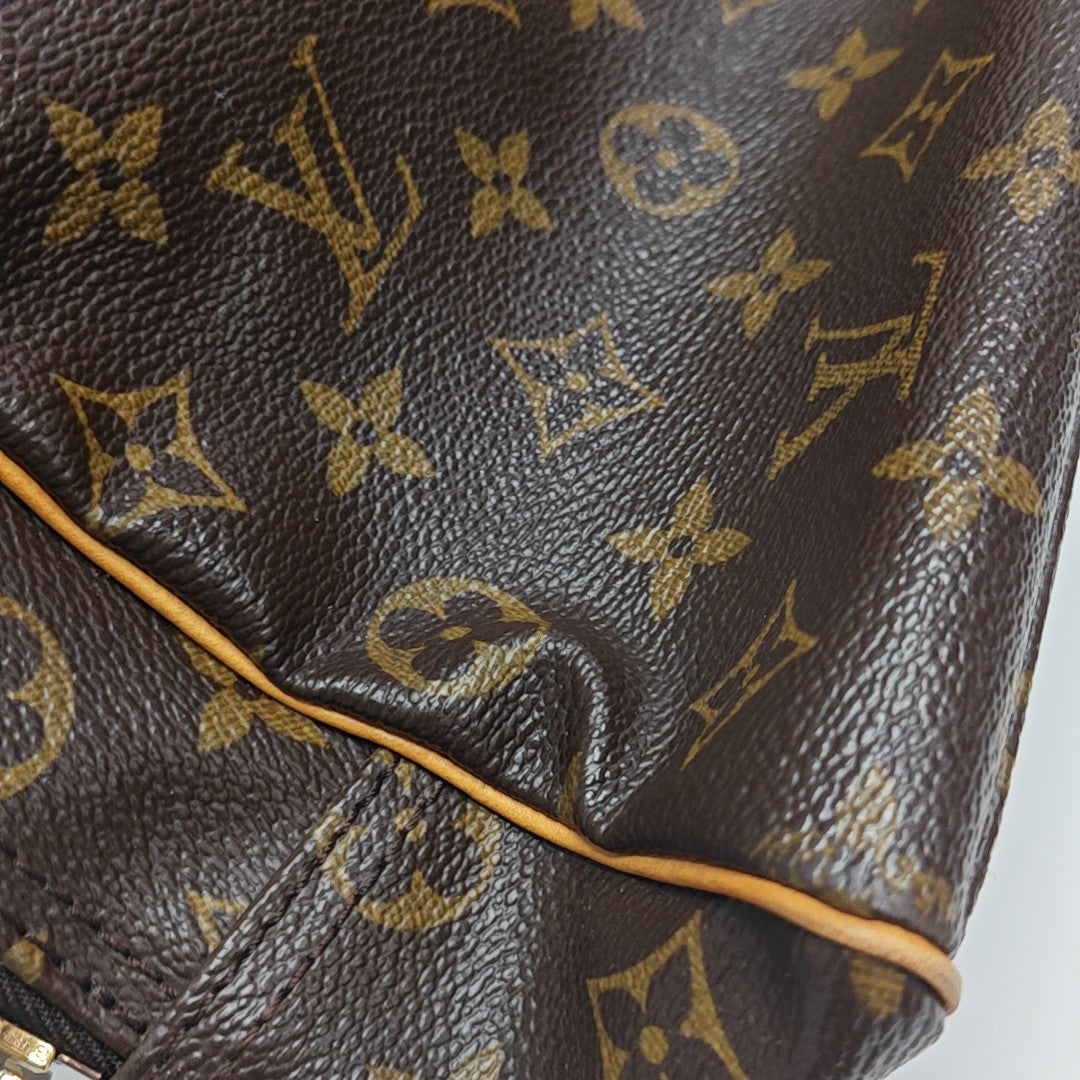 MANHATTAN PM Monogram Coated Canvas Brown
