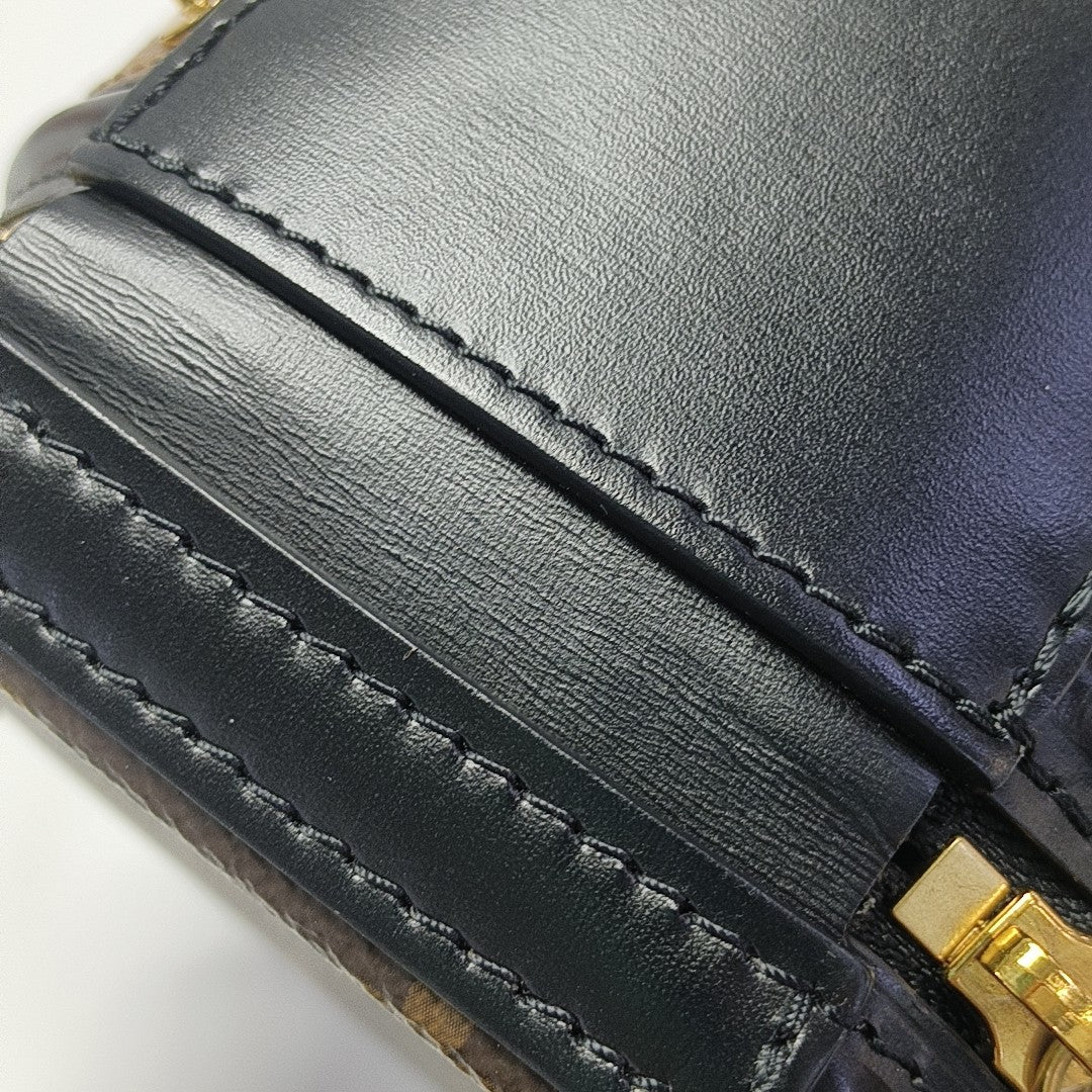 CANNES PM Monogram Coated Canvas Brown