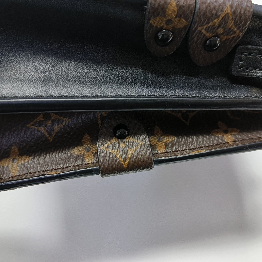 TRUNK Monogram Coated Canvas Brown