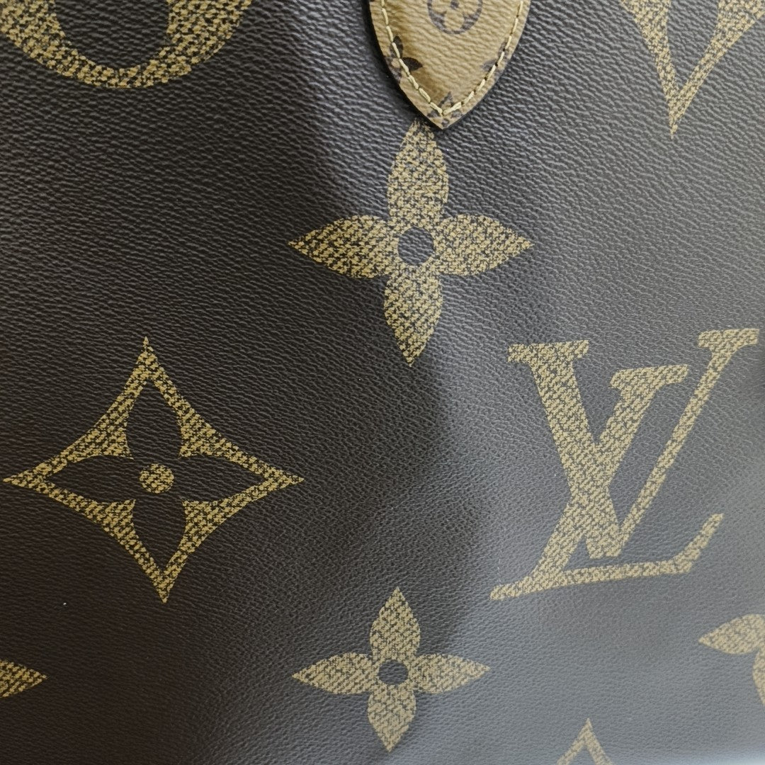 ONTHEGO GM Monogram Coated Canvas Brown