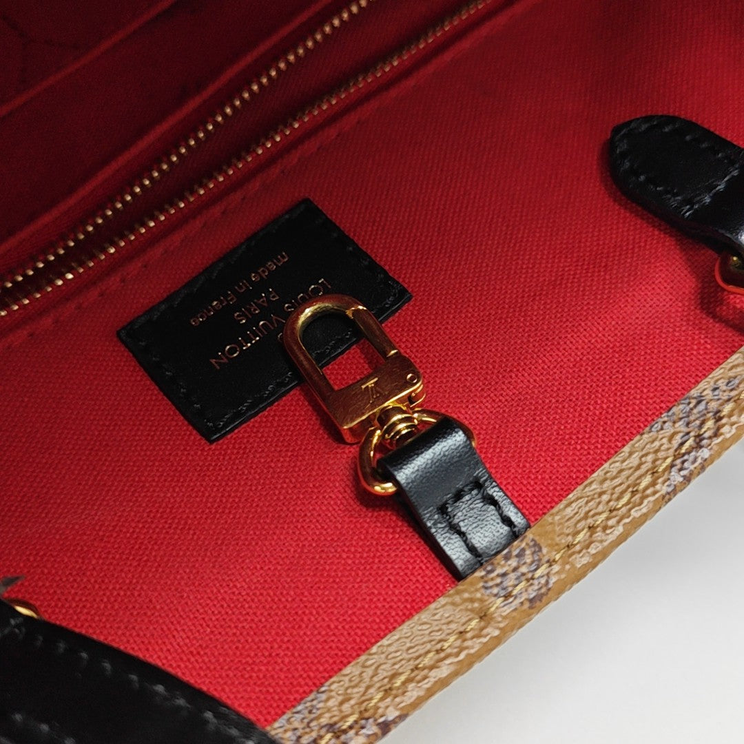 ONTHEGO MM Monogram Coated Canvas Brown