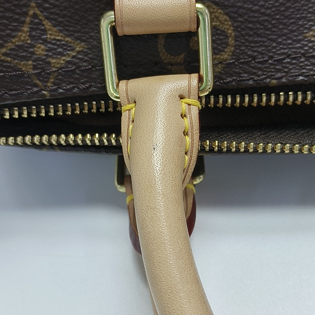 SPEEDY 25 Monogram Coated Canvas Brown