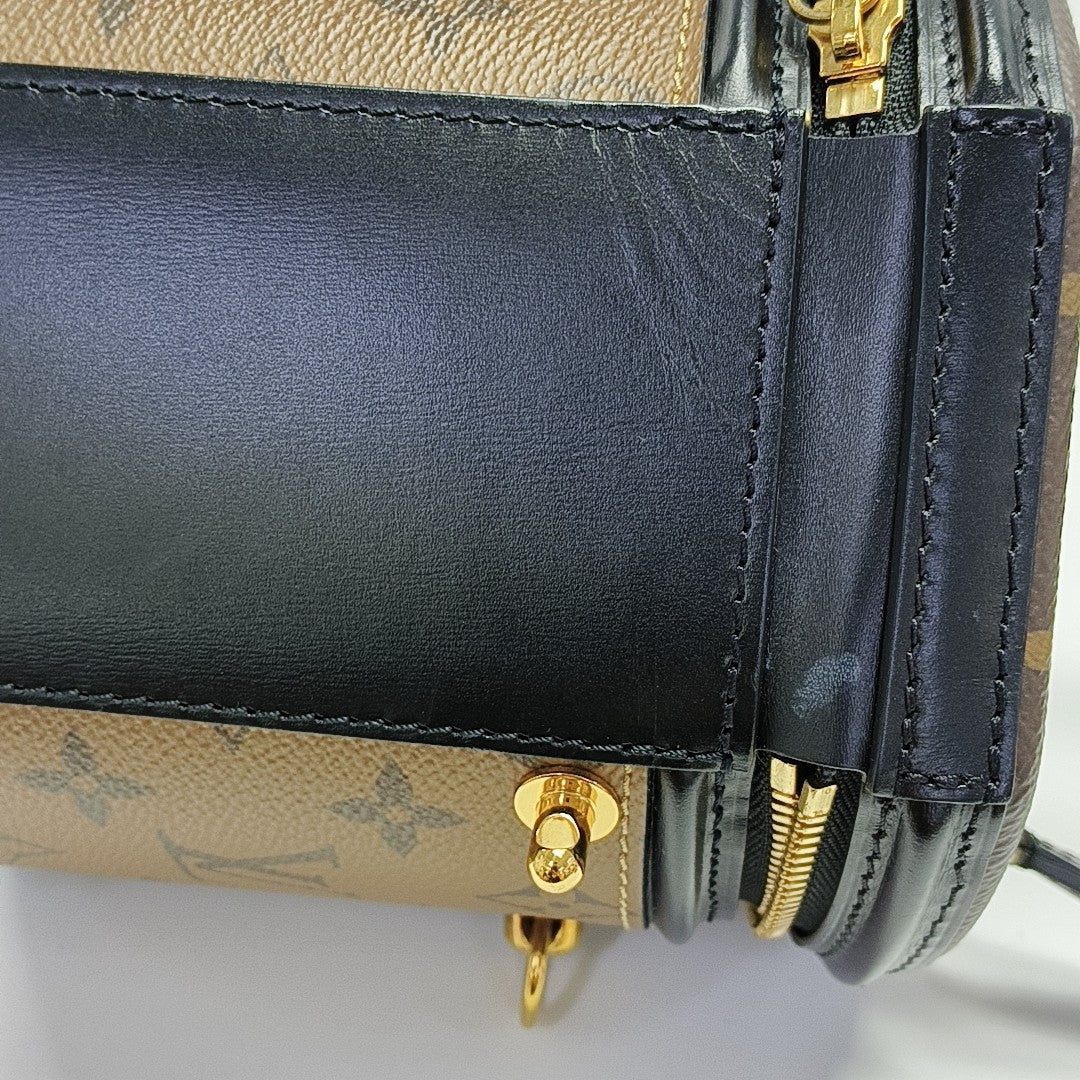 CANNES PM Monogram Coated Canvas Brown
