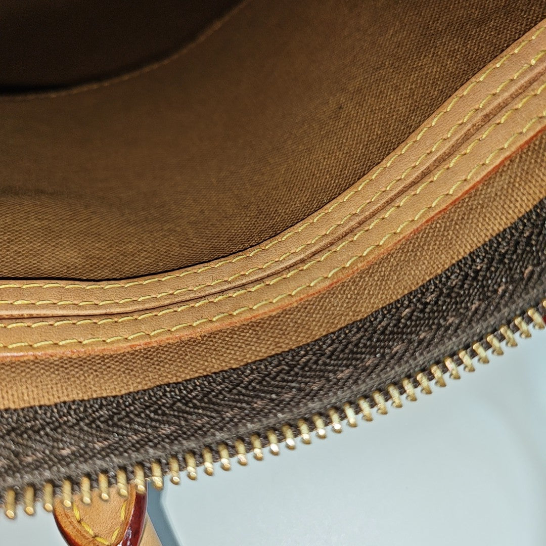 SPEEDY 25 Monogram Coated Canvas Brown