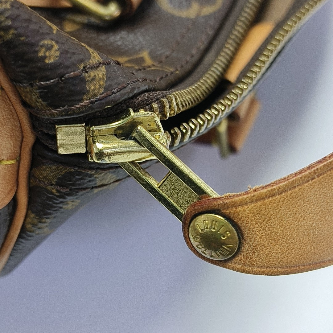 SPEEDY 25 Monogram Coated Canvas Brown