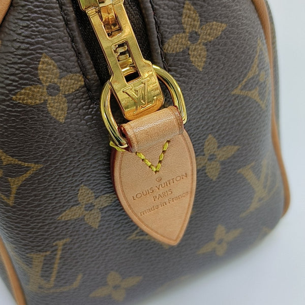 SPEEDY 20 Monogram Coated Canvas Brown