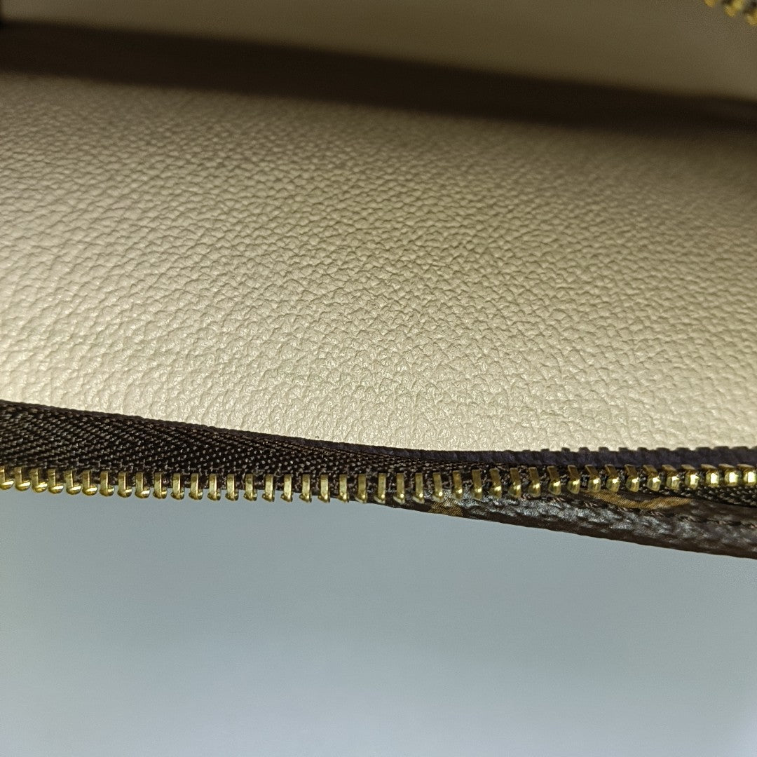 TOILET POCKET 26 Monogram Coated Canvas Brown