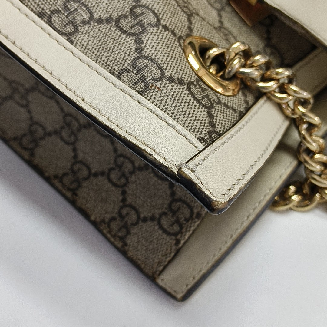 Padlock Small Monogram Coated Canvas Beige