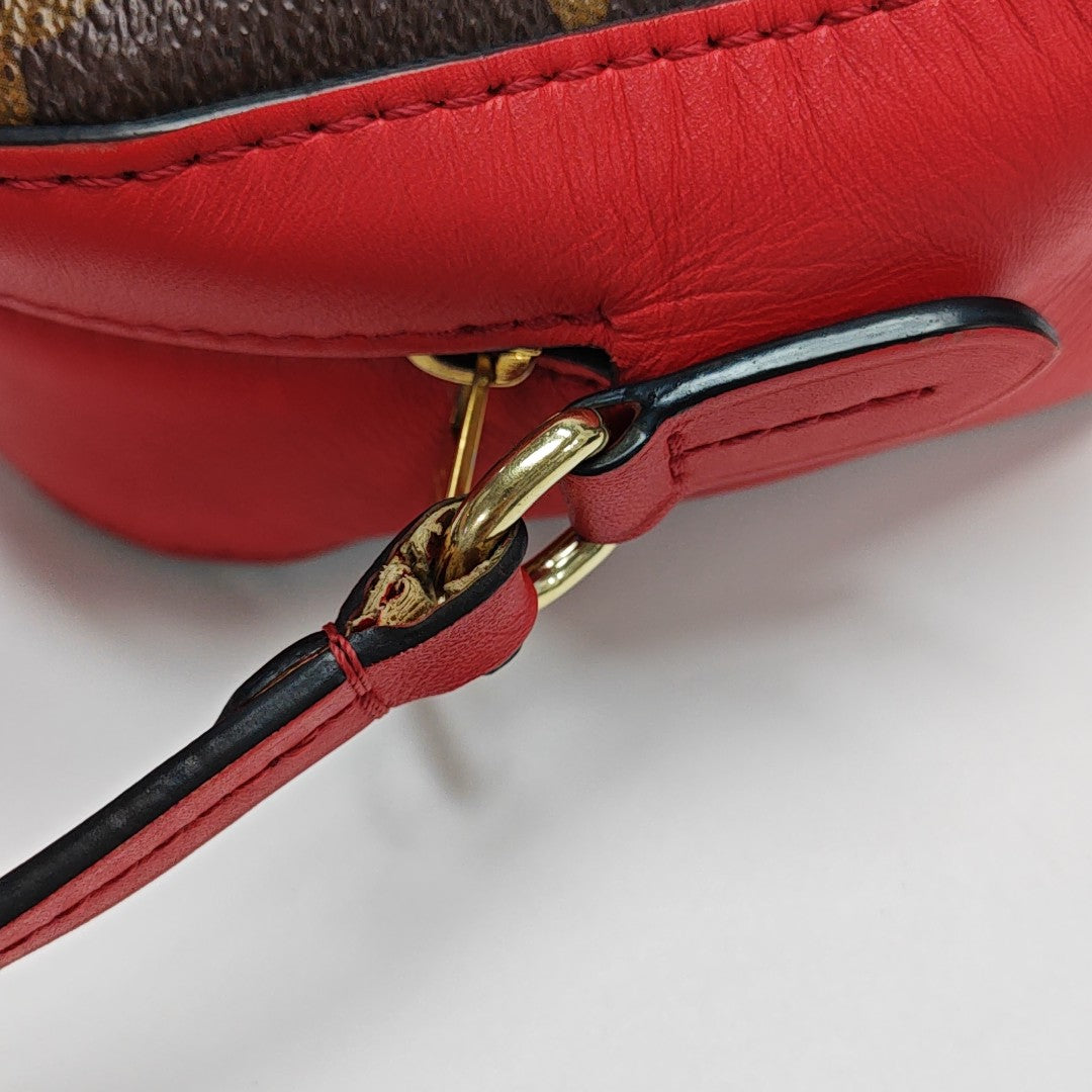 SAINTONGE Monogram Coated Canvas Brown